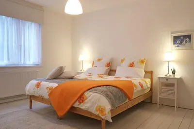 Ein Bett oder Betten in einem Zimmer der Unterkunft Ferienwohnung Heimaterde