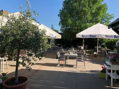 Ein Garten an der Unterkunft Ilvericher Hof