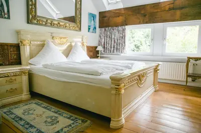 Ein Bett oder Betten in einem Zimmer der Unterkunft Rittergut Haus Laer