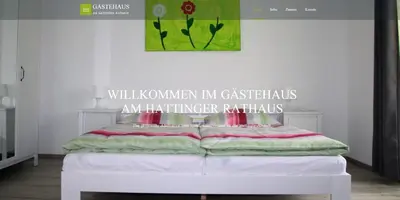 Ein Bett oder Betten in einem Zimmer der Unterkunft Gästehaus am Hattinger Rathaus