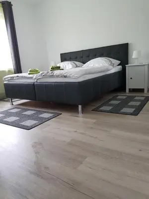 Ein Bett oder Betten in einem Zimmer der Unterkunft Gästehaus am Hattinger Rathaus