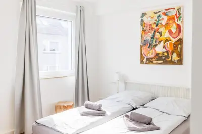 Ein Bett oder Betten in einem Zimmer der Unterkunft Glück Auf Appartements Rüttenscheiderstraße Essen