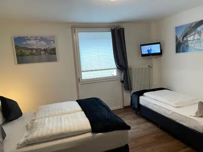 Ein Bett oder Betten in einem Zimmer der Unterkunft Residenz Hotel Wuppertal