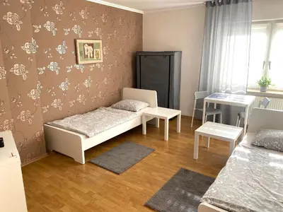 Ein Bett oder Betten in einem Zimmer der Unterkunft Zimmervermietung Lösken