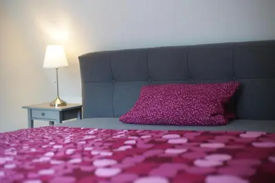 Ein Bett oder Betten in einem Zimmer der Unterkunft Messewohnung Gräfrath