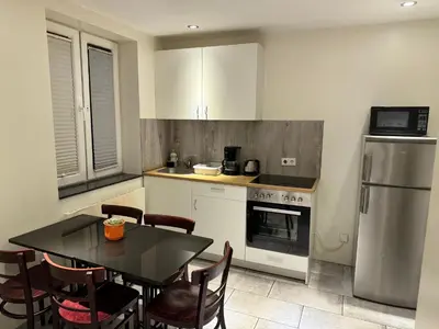 Küche/Küchenzeile in der Unterkunft Bismarck MainHouse Apartments