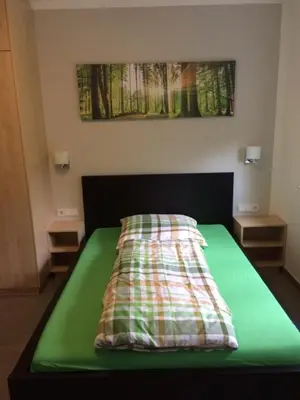 Ein Bett oder Betten in einem Zimmer der Unterkunft Bergcafè - Hotel Kammann