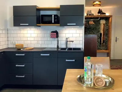 Küche/Küchenzeile in der Unterkunft Wohnungen mit Balkon, 2 Schlafzimmer, nahe Centro & Arena