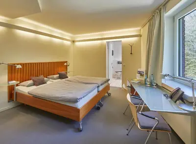 Ein Bett oder Betten in einem Zimmer der Unterkunft Katholische Akademie Schwerte