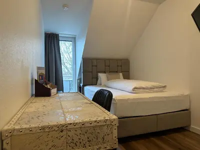 Ein Bett oder Betten in einem Zimmer der Unterkunft Hotel Unterfeldhaus