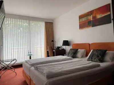 Ein Bett oder Betten in einem Zimmer der Unterkunft Hotel Unterfeldhaus