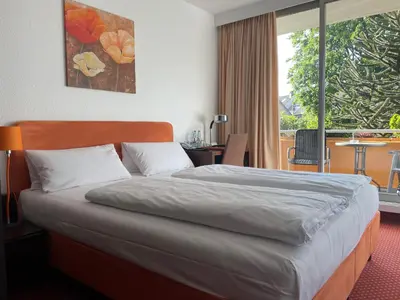 Ein Bett oder Betten in einem Zimmer der Unterkunft Hotel Unterfeldhaus