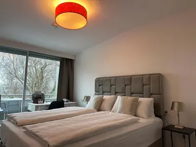 Ein Bett oder Betten in einem Zimmer der Unterkunft Hotel Unterfeldhaus