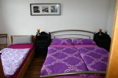 Ein Bett oder Betten in einem Zimmer der Unterkunft Am Buchenberg