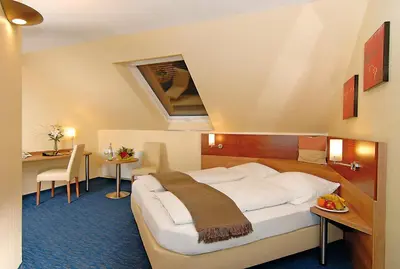 Ein Bett oder Betten in einem Zimmer der Unterkunft Hotel Ostmeier
