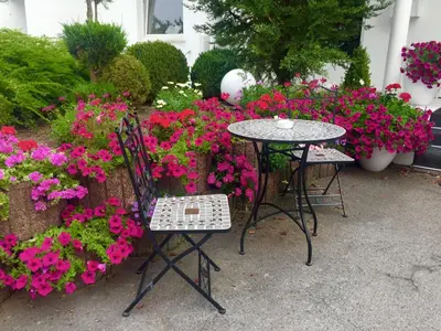 Ein Garten an der Unterkunft Hotel Ramor Garni