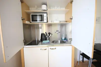Küche/Küchenzeile in der Unterkunft Moderne Studio Apartments und 120qm Wohnungen in Oberhausen, ideal für Geschäftsreisende und Monteure