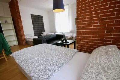 Ein Bett oder Betten in einem Zimmer der Unterkunft Moderne Studio Apartments und 120qm Wohnungen in Oberhausen, ideal für Geschäftsreisende und Monteure