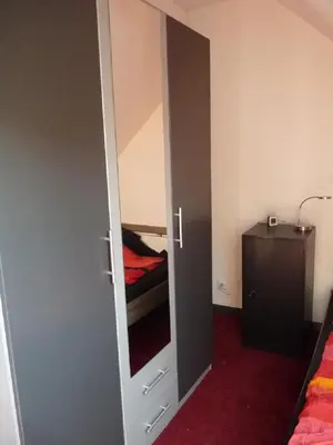 Ein Bett oder Betten in einem Zimmer der Unterkunft Ferienwohnung in Düsseldorf Hassel