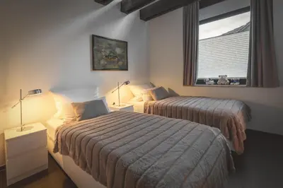 Ein Bett oder Betten in einem Zimmer der Unterkunft WK - Suite