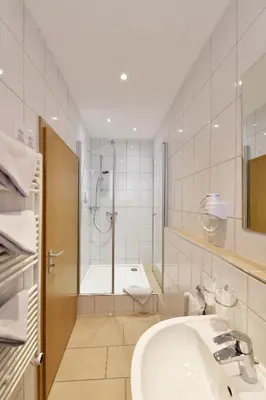 Ein Badezimmer in der Unterkunft Hotel Haus Kleimann-Reuer