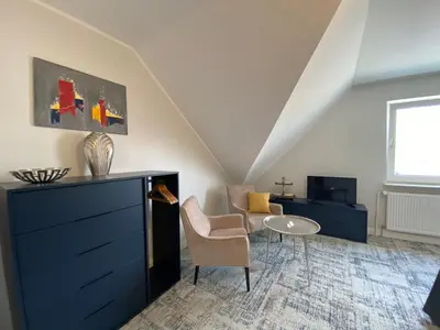 Ein Sitzbereich in der Unterkunft BESOTEL Mettmann- 20 Wohnungen 2 Standorte 35 Schlafzimmer 29 Badezimmer 52 Betten für 73 Gäste