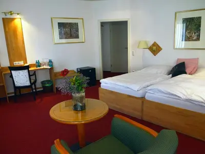 Ein Bett oder Betten in einem Zimmer der Unterkunft Hotel-Nachtwächter