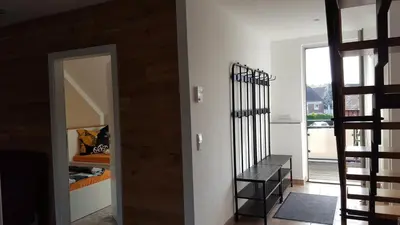 Ein Bett oder Betten in einem Zimmer der Unterkunft Ferienwohnung Kirchhellen 
