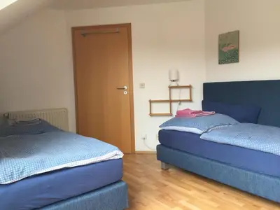 Ein Bett oder Betten in einem Zimmer der Unterkunft Kleine Wohnung mit Terrasse