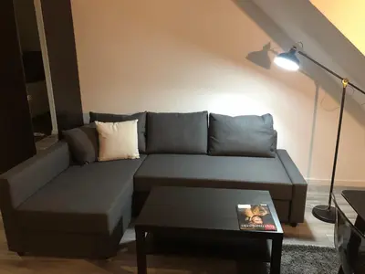 Ein Sitzbereich in der Unterkunft City-Apartment