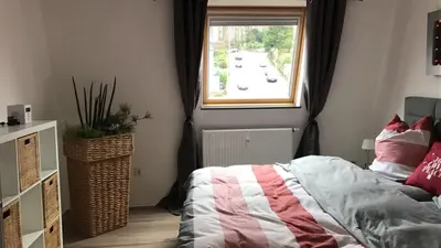 Ein Bett oder Betten in einem Zimmer der Unterkunft Stadtvilla Kö97 - Apartment Relax