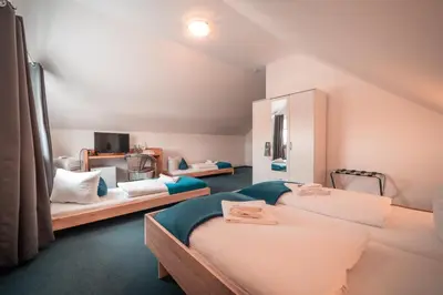 Ein Bett oder Betten in einem Zimmer der Unterkunft Airport Lounge Hotel Düsseldorf