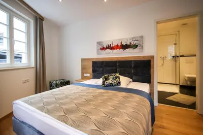 Ein Bett oder Betten in einem Zimmer der Unterkunft Zur alten Krone