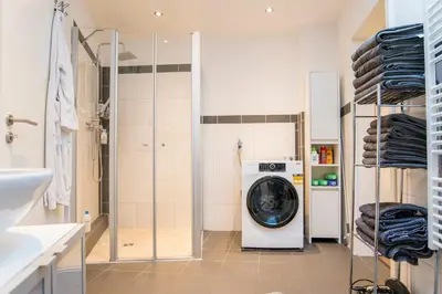 Ein Badezimmer in der Unterkunft White Lofty und White Studio
