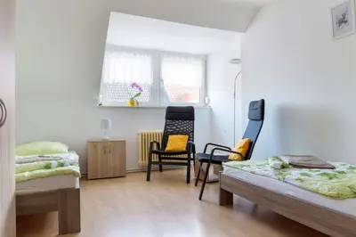 Ein Bett oder Betten in einem Zimmer der Unterkunft Apartment Breite Str. 83