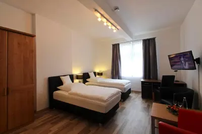 Ein Bett oder Betten in einem Zimmer der Unterkunft Hotel Jammerkrug