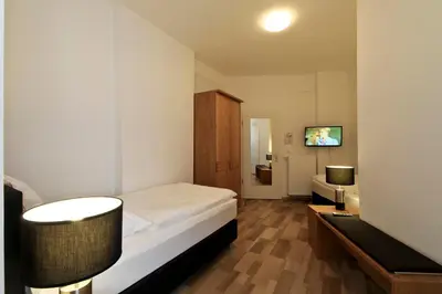Ein Bett oder Betten in einem Zimmer der Unterkunft Hotel Jammerkrug
