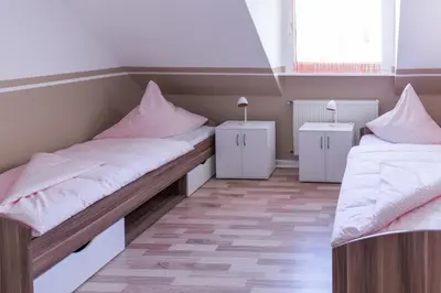Ein Bett oder Betten in einem Zimmer der Unterkunft Apartment Widey Str. 52