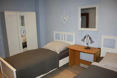 Ein Bett oder Betten in einem Zimmer der Unterkunft Fewo Lirich