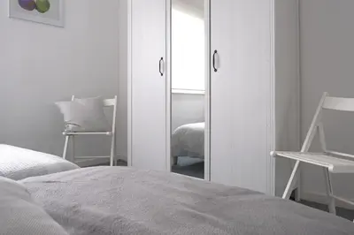 Ein Bett oder Betten in einem Zimmer der Unterkunft Ferienwohnung Speldorf