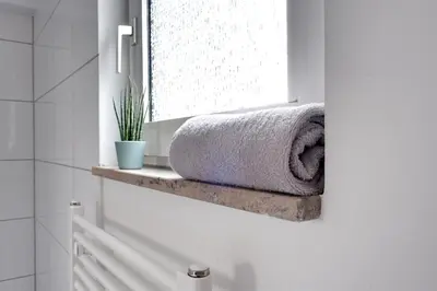Ein Bett oder Betten in einem Zimmer der Unterkunft Ferienwohnung Speldorf