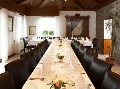 Ein Restaurant oder anderes Speiselokal in der Unterkunft Hotel Restaurant Daute