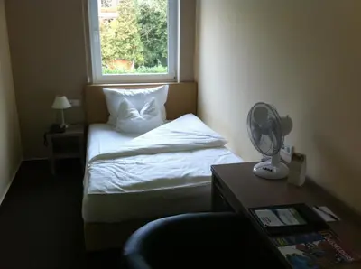 Ein Bett oder Betten in einem Zimmer der Unterkunft Hotel Destination 21