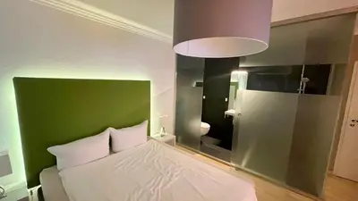 Ein Bett oder Betten in einem Zimmer der Unterkunft smart&beautiful Deluxe