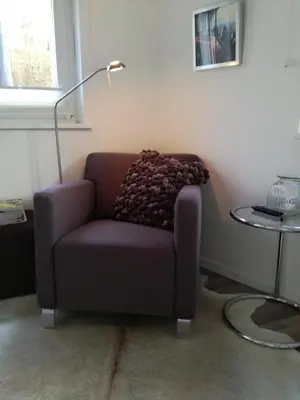 Ein Sitzbereich in der Unterkunft Zimmer zum Hof