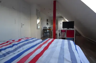 Ein Bett oder Betten in einem Zimmer der Unterkunft Altes Krupphaus auf der Heimaterde