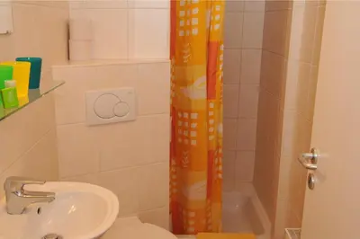 Ein Badezimmer in der Unterkunft Pension Bella Vista
