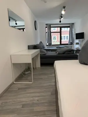 Ein Bett oder Betten in einem Zimmer der Unterkunft Oldtown Apartments Mühlenstr