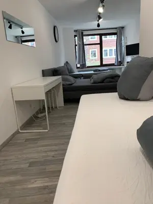Ein Bett oder Betten in einem Zimmer der Unterkunft Oldtown Apartments Mühlenstr