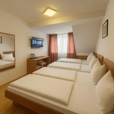 Ein Bett oder Betten in einem Zimmer der Unterkunft Centro Hotel Oberhausen